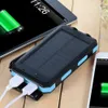 Lampy słoneczne Portable Bank Power 10000mAh Zewnętrzne Backup Battery Pack Dual Panel USB Ładowarka z 2gle Light Carabiner Compass