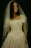 結婚式のドレスのための新しい本物の絵の最高品質安いベストセールエルボーホワイトアイボリーリボンエッジベールブライダルヘッドピース