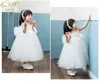 2016 Nouvelle Arrivée Blanc Tulle Jolie Fleur Fille Robes Réel Parti Pageant Communion Bébé Fille Infantile Robe livraison gratuite