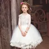 安く象牙のレースのアップリケボールガウンの花の女の子のドレスハーフスリーブチュール聖体拝領のガウン