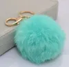 Fashion Real Rabbit Fur Ball Keychain 8cm Lovely Gold Metal Key Chains Ball Pom Poms Plush Keychains Car Keyring Bag Rings