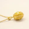 Pendentif oeuf Fabergé émaillé fleur oeuf de Pâques en forme de fleur d'équinoxe pour collier de style russe avec chaîne en cristal et plaqué or