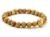 Nouveauté en gros meilleure qualité 8mm perles en bois jaune naturel véritable plaqué or argent tête de Lion Bracelets