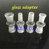 Nyaste glas drop down adapter grossist adaptrar för bongs 18 mm till 14 mm med manlig kvinnlig slipning mun klar joint hetaste glasadapter