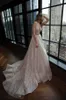 Abiti da sposa sexy con scollo a V profondo 2018 Abiti da sposa Berta senza schienale senza maniche Abiti da sposa di lusso con perline Sweep Train Crystal Illusion Corpetto Abito da sposa