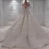 Luxury Big Ball Gown Wedding Dresses Off the Shoulder Wave Design Beaded Crystals Lace Appliques Custom Made Bridal Gowns