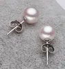 Boucles d'oreilles de goujon de perle blanche de 9 à 10 mm