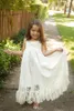 Белые платья для девочек-цветочниц в стиле бохо на свадьбу 2016 г., украшенное бисером и жемчугом, Холтер, красивая линия, кружевные платья с открытой спиной, платья для причастия, вечеринка для малышей S5808202
