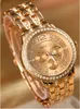 2016 新しいスタイルの有名なジュネーブゴールド腕時計男性女性ステンレス鋼カップルクォーツ時計ファッション流行時計送料無料