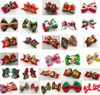 100 -stcs/lot honden verzorgingspoers Kerstmisdierenhaar bogen bowknot haarspeld vakantie -accessoires y11