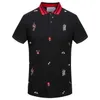 Plus Taglia 3XL Multi Ricami Polo Uomo Fashion Design Maniche a costine Orlo diviso Polo elasticizzata Top maschile