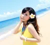 100pcs / lot de la playa de vacaciones en Hawai fiesta de la boda del Frangipani flores artificiales nupcial del pelo Clip de espuma del Plumeria de accesorios para el cabello TAMAÑO: 6 cm