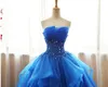 Fancy Royal Blue Prom Dress Ball-toga Quinceanera Jurken Strapless Lace-Up Back Organza Layers Tule Floral Applique met Shining Pailletten