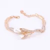 Set di gioielli di perle simulate da sposa fine per le donne Accessori da sposa placcati in oro Collana di cristallo Orecchini Bracciale Set di anelli