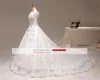 Abito da sposa di cristallo di lusso 2023 Tulle con perline di pizzo A-line Foto reale Ruffle Lungo treno da cattedrale Abiti da sposa sexy senza schienale Bling