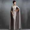 فساتين سهرة طويلة حورية البحر الأنيقة مع Cape Illusion Dresses Janique Dresses New Lace Mother of the Bride Dresses Party Pro2314