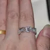 ベカロンブランドフラワーデザイン女性ジュエリーリングTopaz Czダイヤモンド925スターリングシルバーの婚約のウェディングバンドリングの女性のギフト