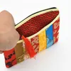 パッチワークシルクブロケードジップコイン財布ジュエリーブレスレットギフトバッグタッセル小化粧品トラベルバッグ女性化粧袋2ピース/ロット