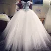 2018 Cheap Sexy Puffy Ball Gown Wedding Dresses Sweetheart Lace Appliques Beads Pearls Tulle Illusion Long Sweep Train Formal Bridal Gowns