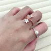 40% de réduction sur la bague en or rose New Korean Tail Ring Wholesales Quality Silver Wedding Love Cute Flower Pearl Crown Leaf Crystal Rhinestone Band Ring