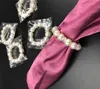 100pcs / Lot perlas blancas anillos de servilleta de la boda de la servilleta de la hebilla para el partido de recepción de boda Decoración de la mesa Material I121