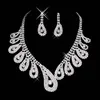 Nytt billigt Bling Crystal brudsmyckeset silverpläterat halsband diamantörhängen Bröllopssmyckeset för brud kvinnor Bröllopstillbehör