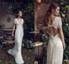 Vintage Sheath Wedding Dresses Lihi Hod Lace Bohemian Deep V neck Backless Boho Bridal Gowns 2019 Floor Length Short Sleeves Custom