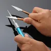 Affilacoltelli professionale a forma di penna multiuso con diamante per affilare i coltelli con mola per ami da pesca in stock