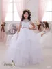 2016 Suknia balowa Dzieci Suknie ślubne z krótkimi rękawami i warstwową spódnicą Appliqued Tulle White Communion Suknie dla dziewcząt