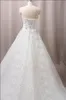 Nieuwste luxe trouwjurken lieverd Swarovski kristallen kralen backless baljurk Kapel trein bling Customed Ivory bruidsjurken