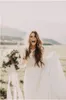 2020 Cheap Bohemian Country Wedding Dresses Sheer Long Sleeves Jewel Neck A Line Lace Applique Chiffon Boho Plus Size Formal Bridal Gowns