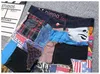 Partihandel-Fashion Mens Hip Hop Dance Jeans Kläder Patchwork Färgglada Regular Fit Designer Night Club Jeans för män