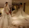 Vestidos de novia de Cenicienta de tren de catedral de lujo 2019 con correas de novia Con cuentas de cristal Rhinestone Ilusión Princesa Vestidos de fiesta nupciales