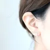 Alliage de zinc torsadé lien tige mode boucles d'oreilles, personnalité long tube boucles d'oreilles en gros livraison gratuite femmes vacances meilleur cadeau