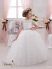2016 Mini robes de mariées avec manches courtes et longueur au sol en dentelle appliques robe de bal belles robes de filles de fleurs avec ruban rose perlé
