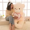 Boneca de pelúcia brinquedos de pelúcia atacado urso tático amor luz segura o coração urso criativo Presente de dia de professores por atacado