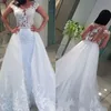 2020 Nuevos vestidos de novia elegantes y románticos de una línea Mangas transparentes Apliques de encaje Vestios De Novia Vestidos de novia con capas sin espalda 366