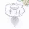 Parure di gioielli per le donne Accessori placcati in oro/argento Ciondolo Dichiarazione Perline africane Collana di cristallo Orecchini Bracciale Anello