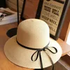 Partihandel - Kvinnor Mode Summer Straw Hat Sun Hat Folding Travel Beach Cap med härlig Bow Beige Färg Gratis frakt