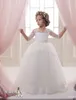 2016 Robes de première communion princesse pour les filles avec demi-manches et fleurs ceinture tulle et dentelle belles robes de filles de fleurs personnalisées