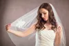 New Hight Quality Bridal Veils Cheap Romantic One Layer Wrist White Ivory Cut Edge With Pearl Bridal Head Pieces For Wedding Dresses