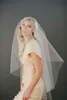 Alta calidad Superventas Romántico Fingertip Redes y flores de color champán Pearl Cut Edge Veil Piezas de cabeza nupcial para vestidos de novia
