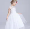 Piękne dziewczyny sukienki na śluby księżniczka puffy tulle dziewczęta korowód samica sheer neck dziurka gorset back koronkowe aplikacje nosić dzieci