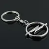 5pcs / lot Auto-Logo Keychain-Schlüsselring-Schlüsselring-Schlüsselring der Art- und Weisemetall3 3D Chaveiro Llavero für Opel Auto-hängende Autozubehör Großverkauf