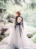 Black and Ivory A Line Wedding Dresses Illusion Long Sleeves Lace Bodice Tulle Skirt Sexy Backless Gothic Bridal Gowns