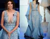 Madalina Ghenea Платья знаменитостей 2016 Sanremo Сексуальная прозрачная шея Вечерние платья ALine с длинными бисером и открытой спиной Роскошные Pagea3188777