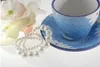 Vit färg glänsande pärlor servett ringar för bröllop bankett fest bord dekoration tillbehör gratis frakt