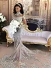 Lujo brillante 2017 vestido de novia de diseñador Sexy Sheer Bling con cuentas apliques de encaje cuello alto ilusión manga larga sirena capilla vestidos de novia