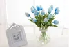 50pcs tulips tulips الاصطناعية بو زهرة باقة لمسة حقيقية للزلزال المنزل الزفاف الزهور الزهور 11 ألوان الخيار