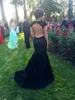 Black Lace Prom -klänningar Öppna ryggen täckta ärmar Sexiga långa sjöjungfru aftonklänningar afrikanska festklänningar9787669